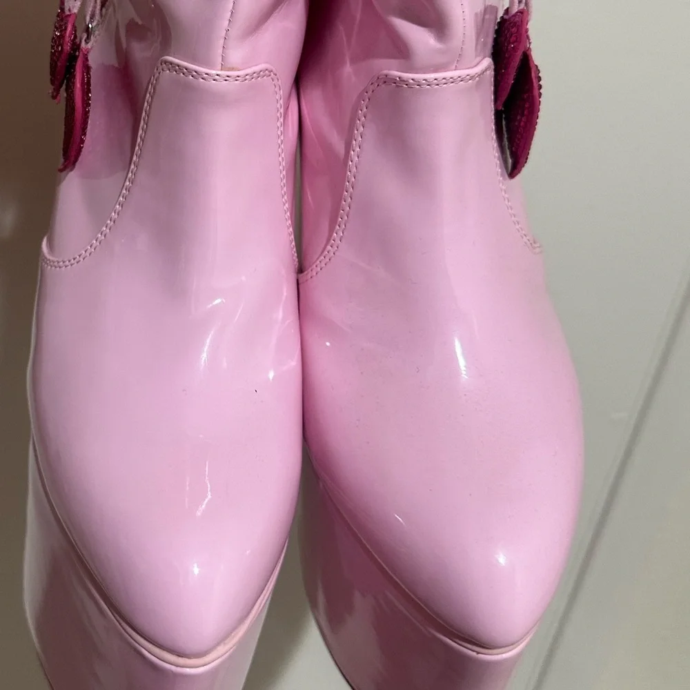 Dolls Kill Glossy Pink Platform Boots with Heart Accents